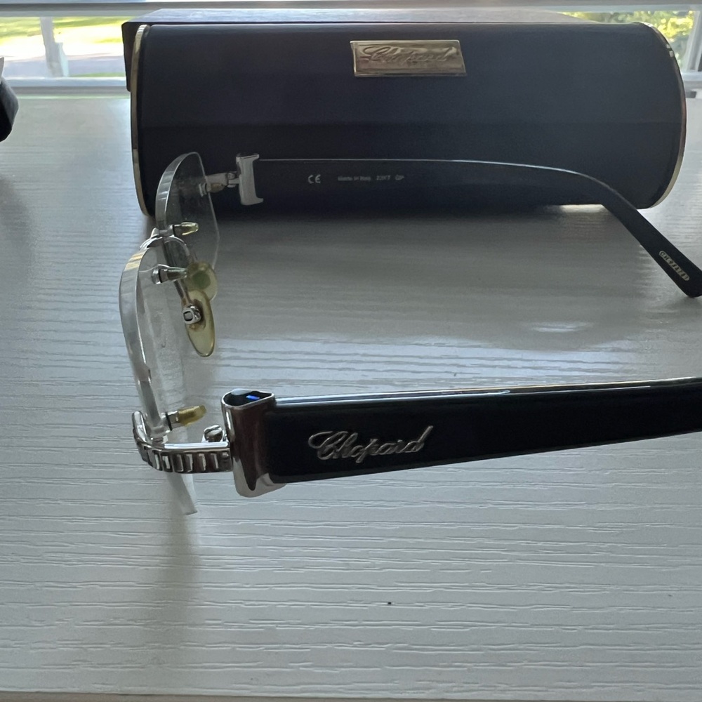 Chopard Elegant Black and Silver Rimless Glasses